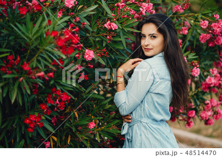 girl near flowers 48514470