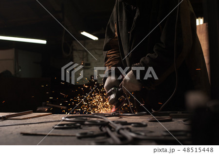 Close-up - Blacksmith Working Process. 48515448