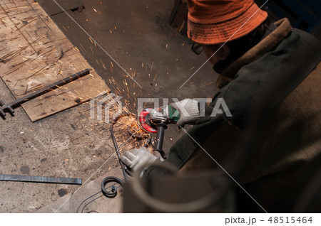 Male Blacksmith Is Working On His New Forged Products 48515464