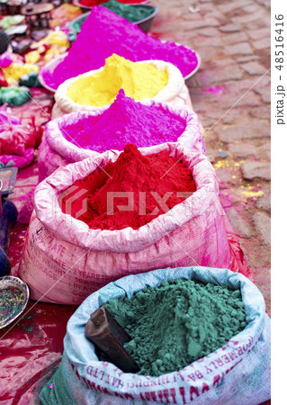 Bags of colored powdered paint sit waiting to be sold to Holi Festival celebrants Bags of colored powdered paint sit waiting to be sold to Holi Festival celebrants 48516416