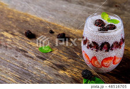 Chia pudding with fresh raspberries and strawberry Chia pudding with fresh raspberries and strawberry 48516705