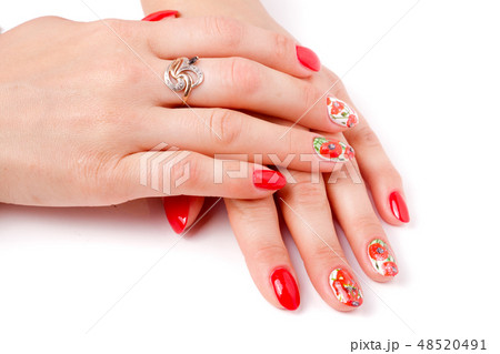 red manicure with a pattern isolated on white background red manicure with a pattern isolated on white background 48520491