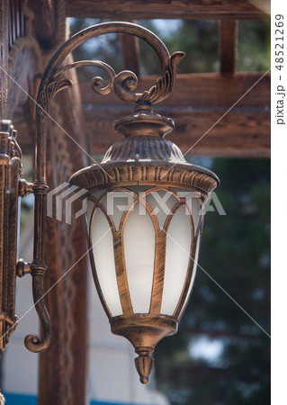 Vintage street light in the metal frame 48521269