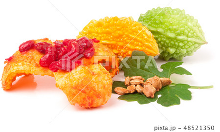green and yellow momordica with leaf seeds isolated on white background green and yellow momordica with leaf seeds isolated on white background 48521350
