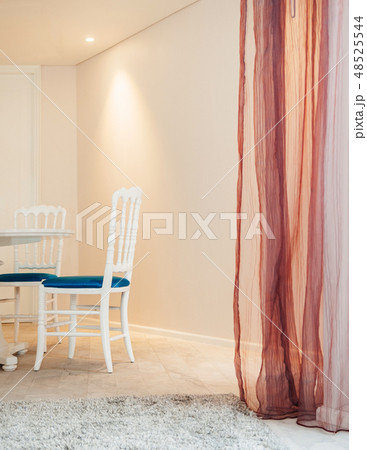 Vintage interior white wood chairs and carpet Vintage interior white wood chairs and carpet 48525544