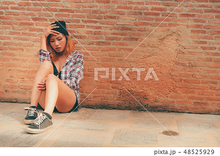 Depressed teenage woman feeling sad and lonely. Depressed teenage woman feeling sad and lonely. 48525929