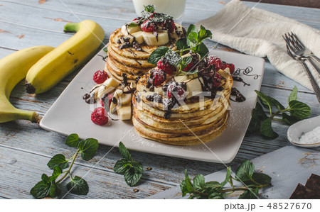 Homemade chocolate banana pancakes Homemade chocolate banana pancakes 48527670