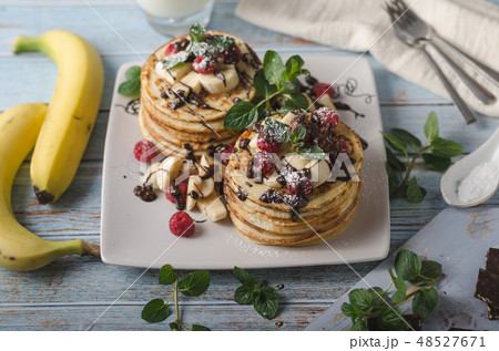 Homemade chocolate banana pancakes 48527671