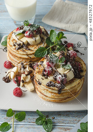 Homemade chocolate banana pancakes 48527672