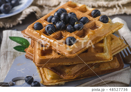 Crispy homemade waffles with berries Crispy homemade waffles with berries 48527736