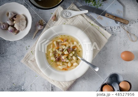 Smoked meat soup with pasta inside 48527956