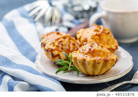 Traditional meat mini pies on a plate. 48531876