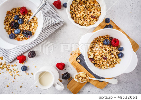 Granola with milk and berries Granola with milk and berries 48532061