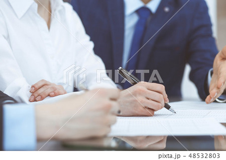 Bookkeepers team or financial inspectors making report, calculating or checking balance. Group of 48532803