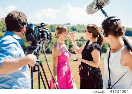 Model in the make-up during video shoot on production set 48534094