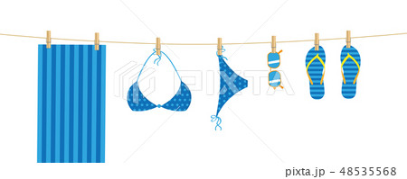 blue beach items hang on a linen 48535568