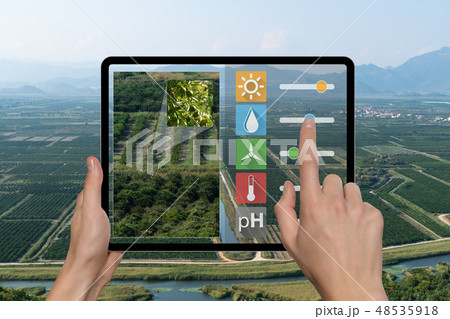 Farmer with tablet Farmer with tablet 48535918