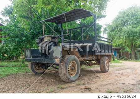 Abandoned car in countryside 48536624