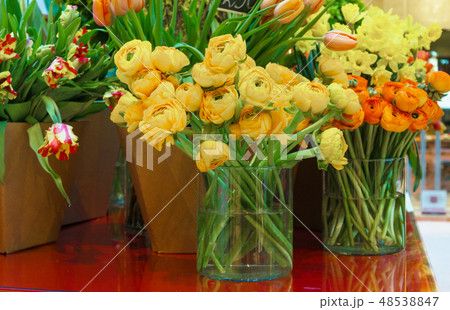 Flower shop concept. Close-up beautiful lovely bouquet of mixed flowers on wooden table. Flowers 48538847