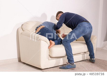 People and abuse concept - Aggressive man beats woman, domestic violence 48539736