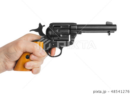 Hand with revolver gun 48541276