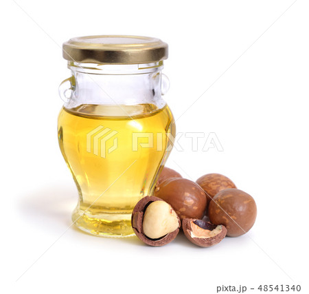 Macadamia nuts oill isolated on white background Macadamia nuts oill isolated on white background 48541340