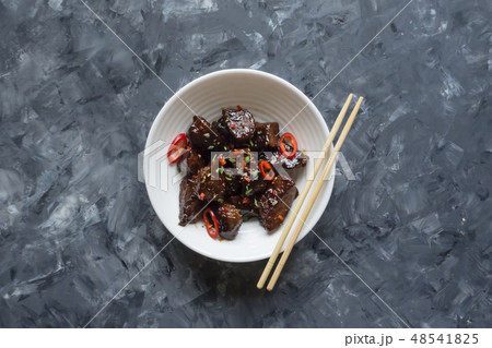 Lamb in sweet and sour sauce. Asian cuisine. Lamb in sweet and sour sauce. Asian cuisine. 48541825