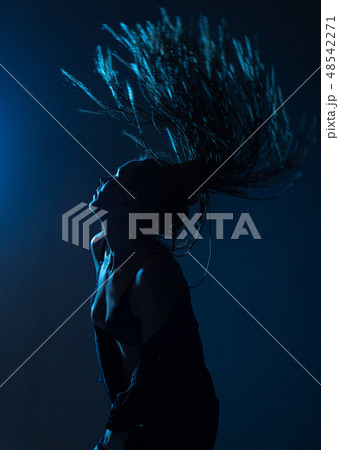 woman afro pigtails raincoat dance floor lights woman afro pigtails raincoat dance floor lights 48542271