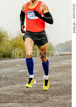 athlete runner in compression socks 48543595