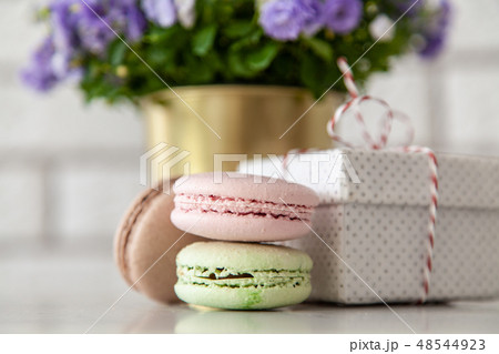 Macarons, gift boxes and flowers 48544923