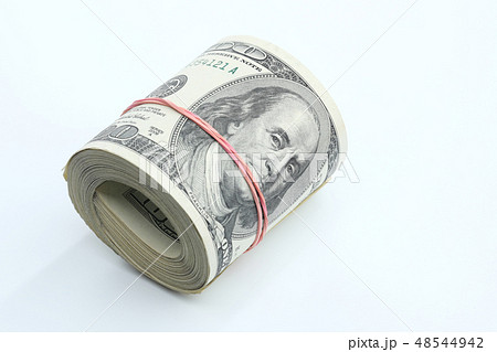Many dollar banknotes on white background. National American currency Many dollar banknotes on white background. National American currency 48544942