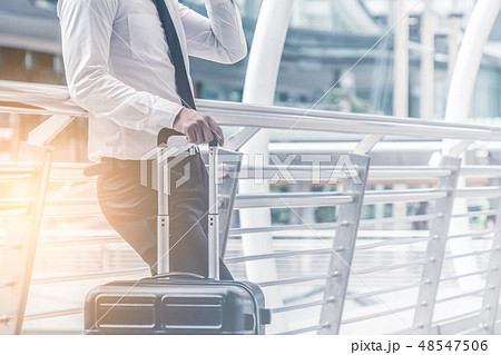 Business man with Luggage Business Trip concept Business man with Luggage Business Trip concept 48547506