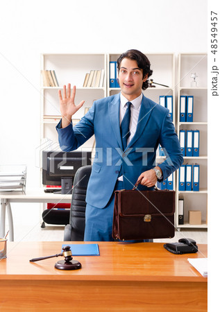 Young handsome judge sitting in courtroom   48549457