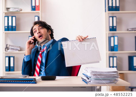 Young handsome businessman sitting in the office  48552225