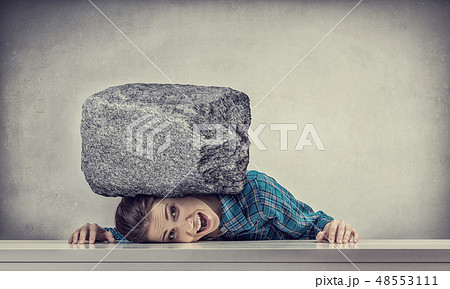Tired girl under pressure Tired girl under pressure 48553111