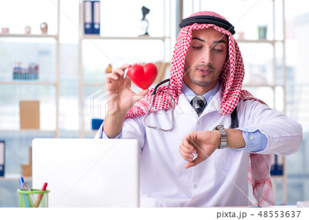 Arab doctor cardiologist working in the clinic  48553637