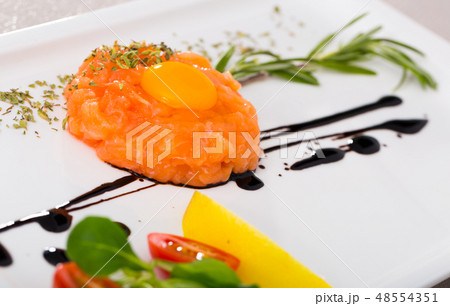 Raw salmon tartare Raw salmon tartare 48554351