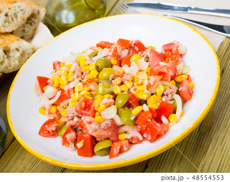 Plate of tasty salad with tuna Plate of tasty salad with tuna 48554553