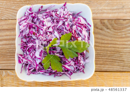 Red cabbage salad with onion and mayonnaise 48561337