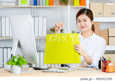 Business woman working in startup office. Business woman working in startup office. 48562290