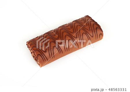Chocolate biscuit roll cake isolated on white background. 48563331