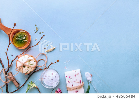 Natural handmade soap, spa organic, aromatic salt. Flat lay on a blue background Natural handmade soap, spa organic, aromatic salt. Flat lay on a blue background 48565484