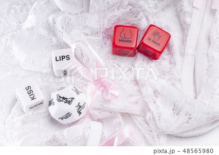 Toys for adults. Sex toys. Cube with sexy poses, Kama Sutra.Cubes with Kama Sutra poses for sex 48565980