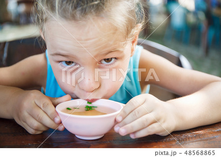 Baby boy is eating soup in Thailand 48568865