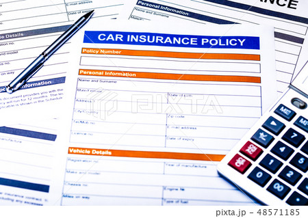 Car Insurance Policy. Documents, Pen and Calculator on Table 48571185