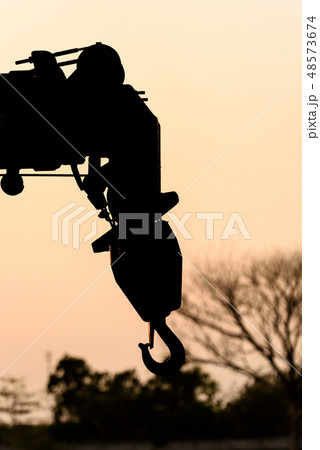 silhouette hook of crane sunset background silhouette hook of crane sunset background 48573674