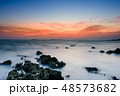 Beautiful rocky sea beach at the sunset 48573682