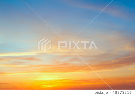 Majestic sunrise sundown sky with gentle clouds Majestic sunrise sundown sky with gentle clouds 48575219