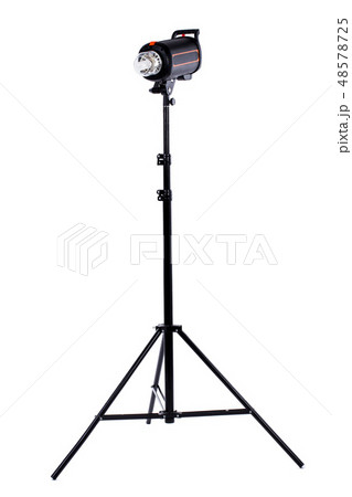 A studio strobe on a light stand. A studio strobe on a light stand. 48578725