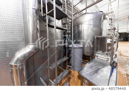 Chrome-plated pipes, wires and devices. Industrial background 48579448